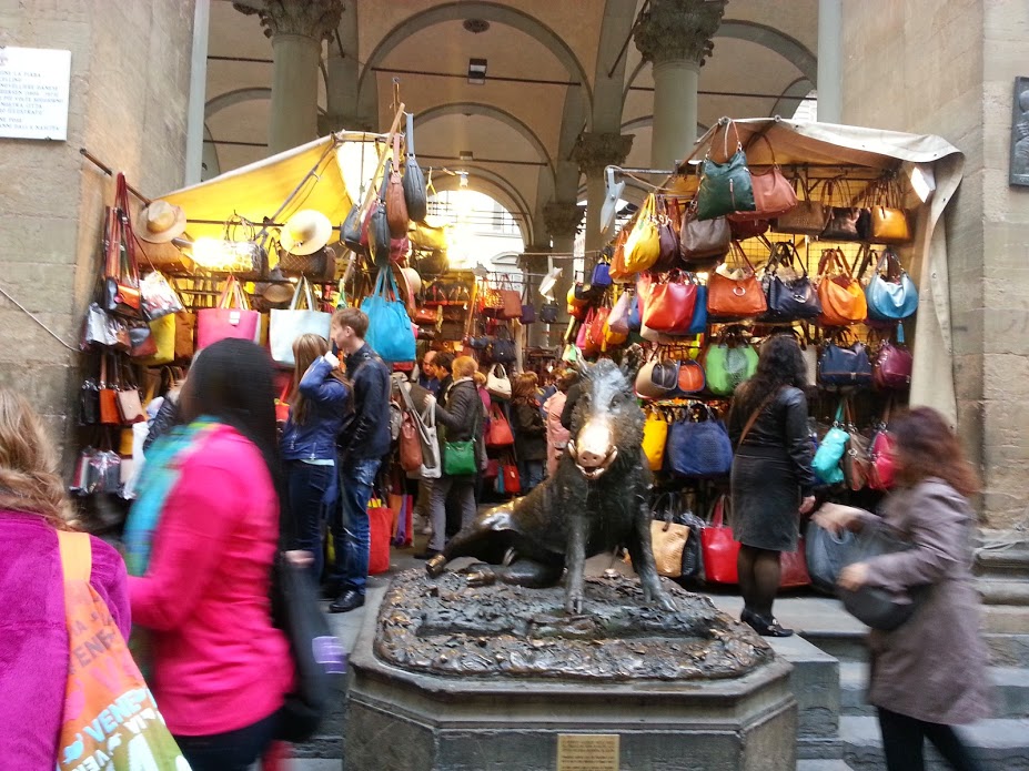 Il Porcellino. Rub the pig and donate some coins for good luck!