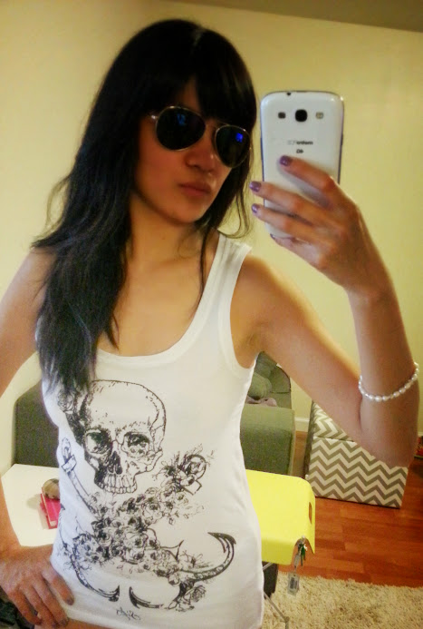 Sunglasses from Nau! Skull shirt from Sisley. Bracelet from Federica :)