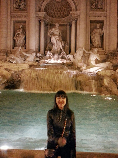 Making a wish at Trevi Fountain in Rome. 